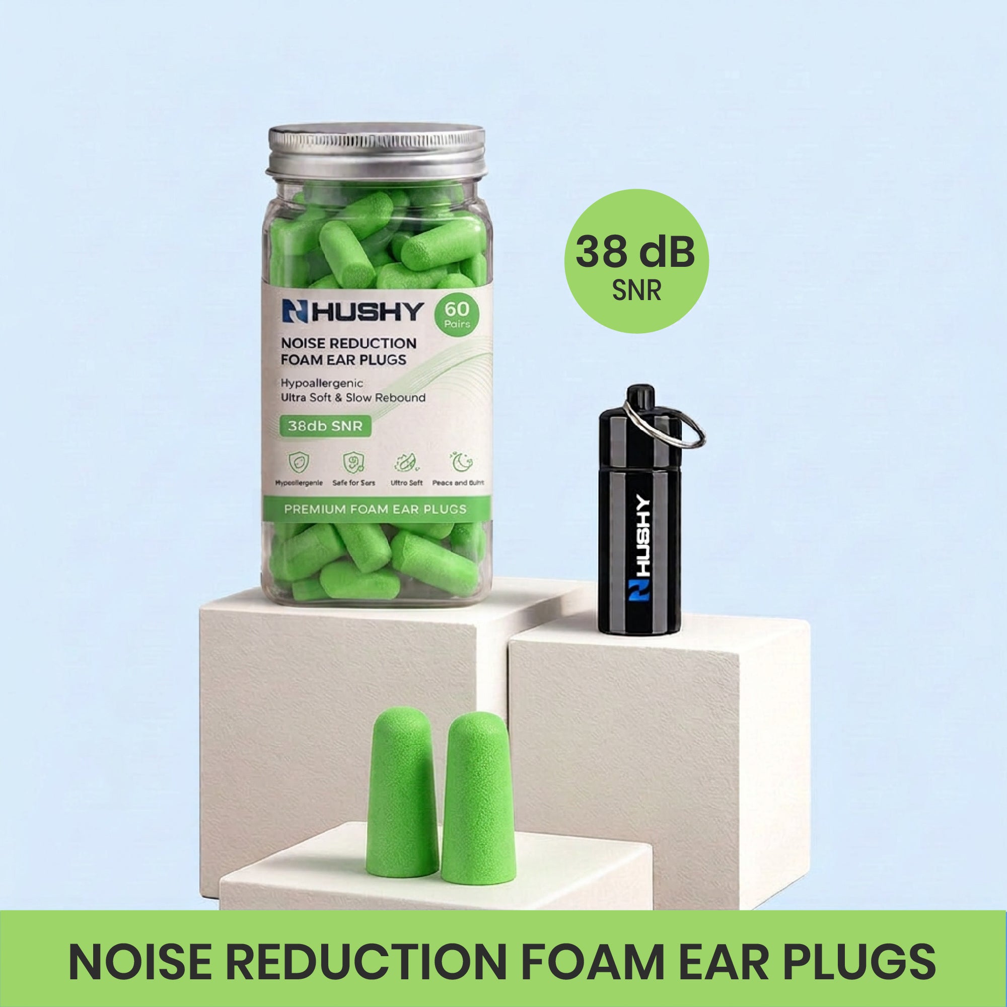 Hushy noise reduction foam ear plugs with packaging and ear plugs on a light green background