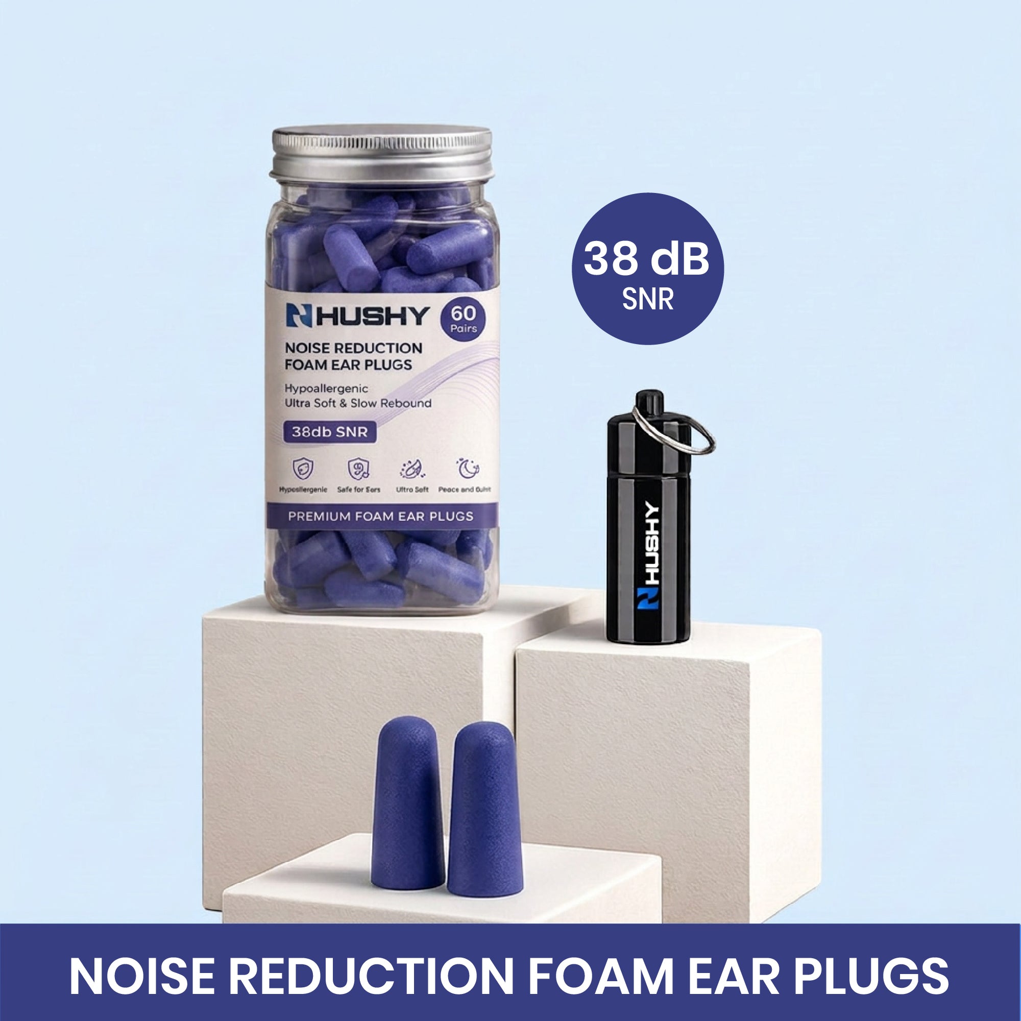 Hushy noise reduction foam ear plugs with packaging and ear plugs on a light blue background