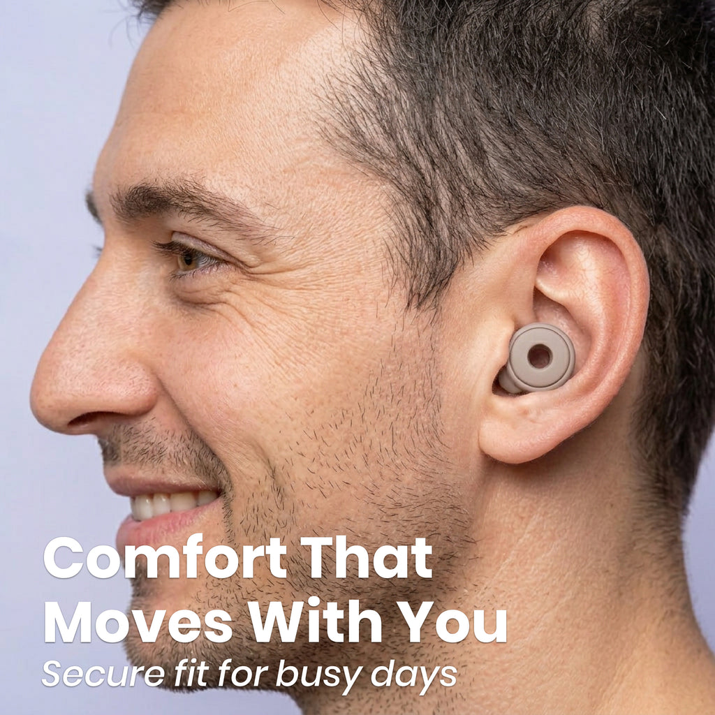 Man wearing wireless earbuds with text 'Comfort That Moves With You' on a light purple background
