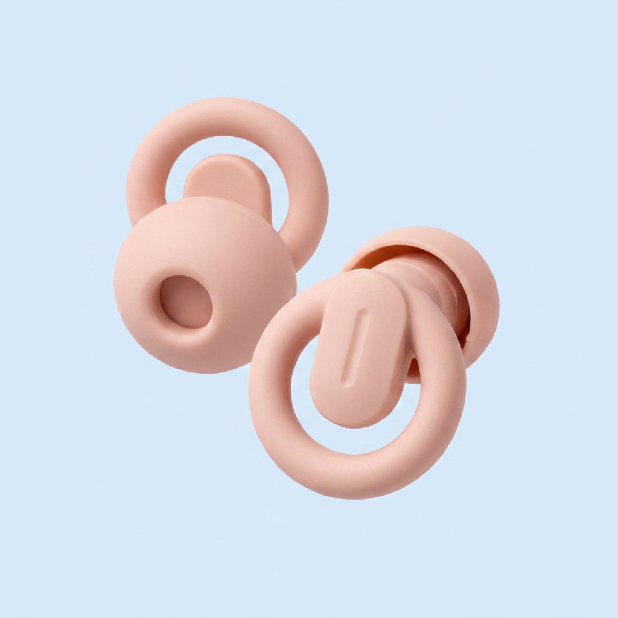 Two pink baby teething rings on a light blue background